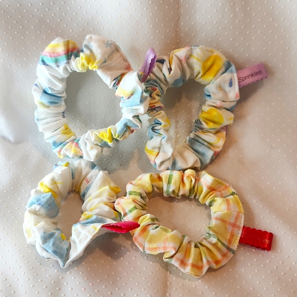 4/$15 Sprinkles Scrunchies. Variety of sizes.
